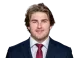 Eli Merck headshot