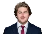 Eli Merck headshot