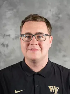 Adrian Sienko headshot