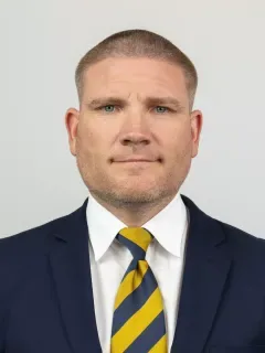 Tosh Lupoi headshot