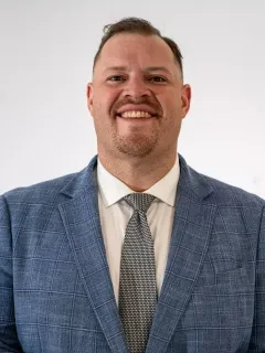 Travis James headshot