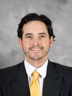 Adam Pilapil headshot