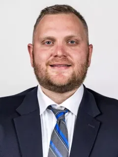 Alex Devine headshot
