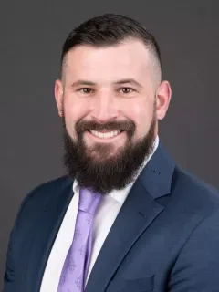 Damon Magazu headshot